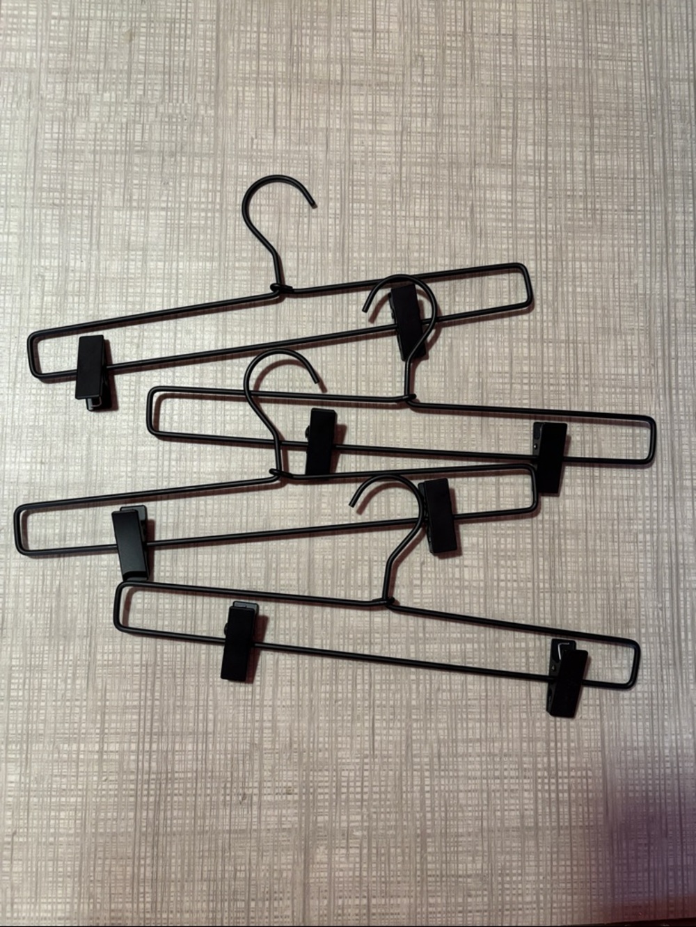 Set of Black Metal Clip Hangers - 4 Pack